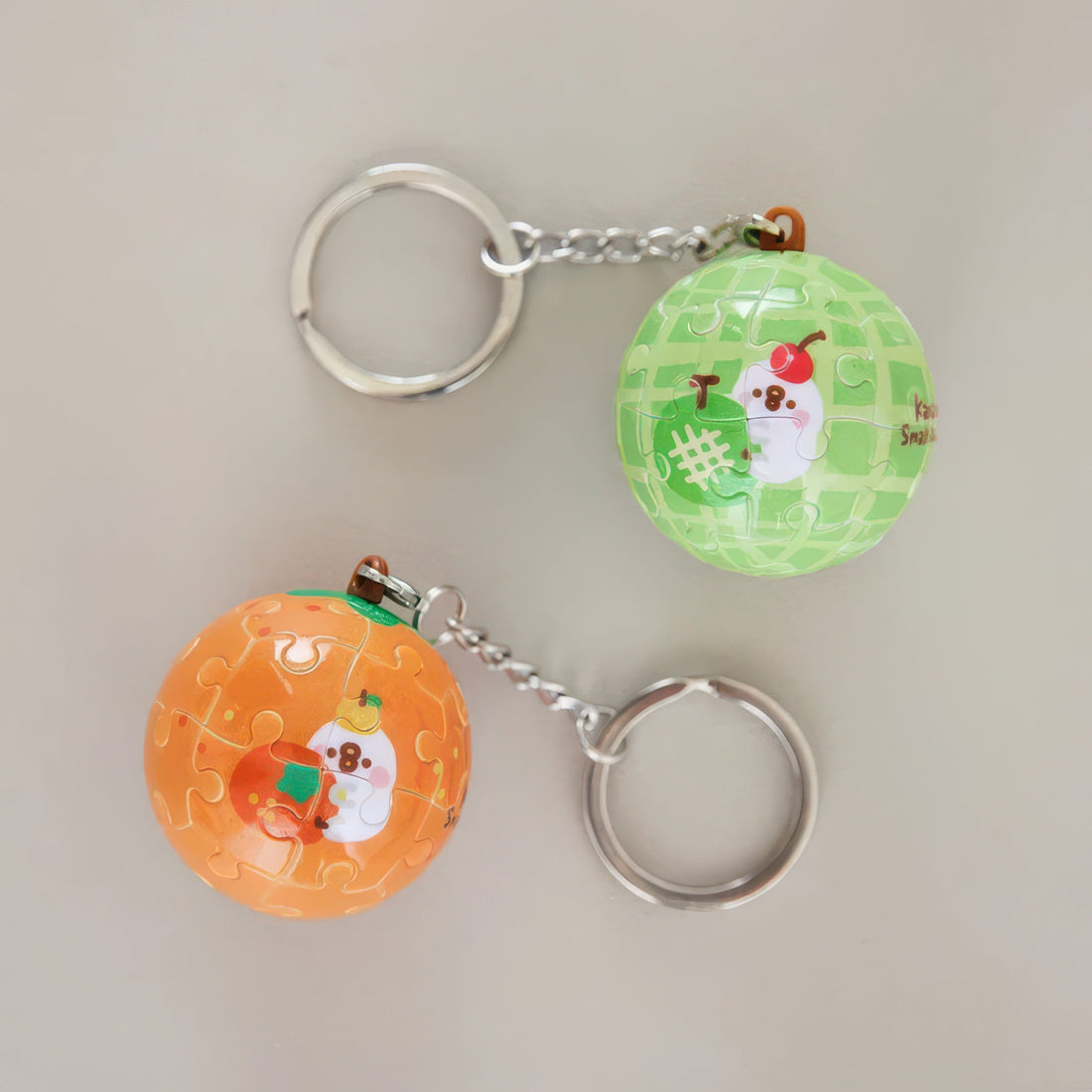 pintoo-a3620-animal-fruit-gift-box-orange-and-cantaloupe-48-multipack-plastic-keychain-puzzle